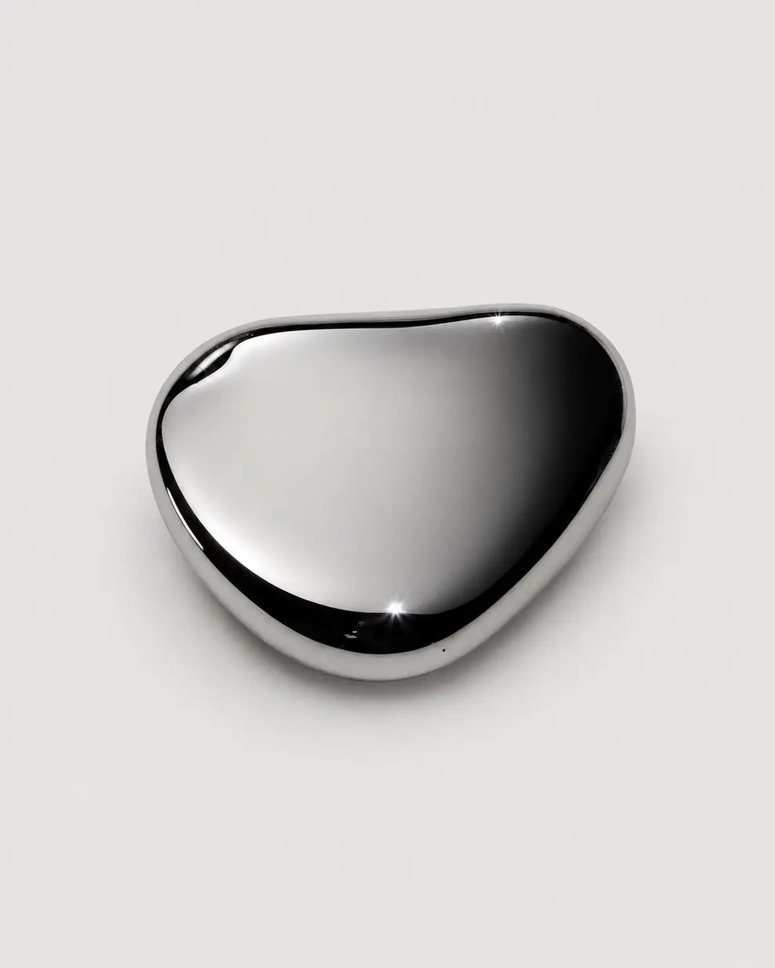 Closed Skinsei Labs chrome compact